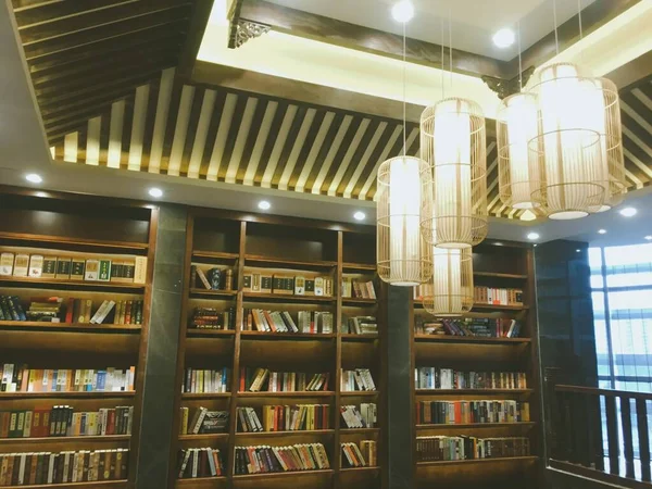 library interior with a book and a lot of books