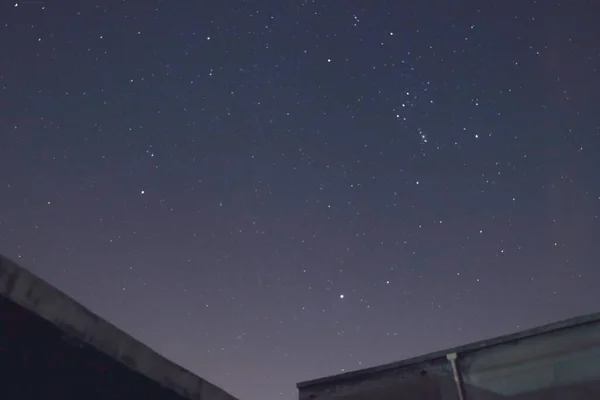 night sky with stars and snow