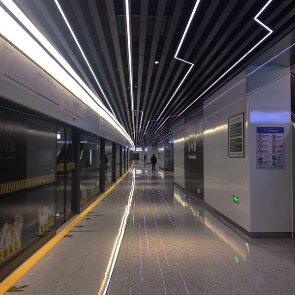 empty underground tunnel with lights and light