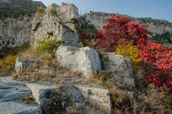 autumn landscape with a stone and a large stones