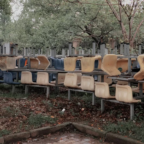 old and dirty chairs in the park