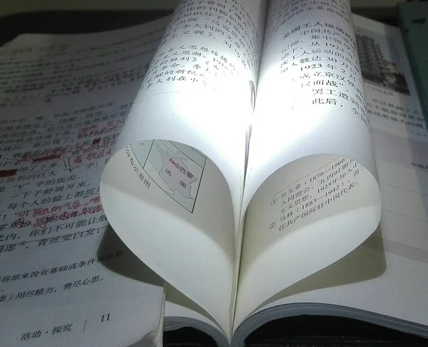 a closeup shot of a book with a heart