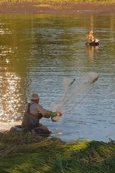 man and woman in a boat