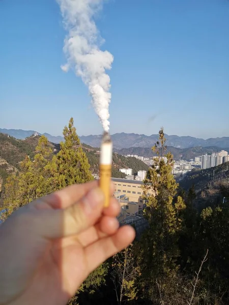 smoking pipe with smoke and chimney