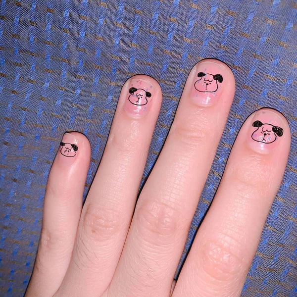 hands of women with blue eyes and smile on finger