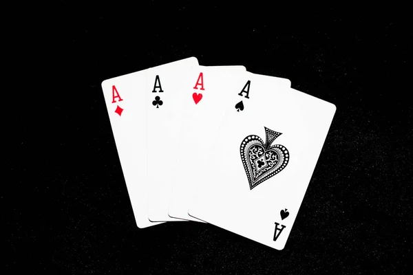 playing cards with a black background