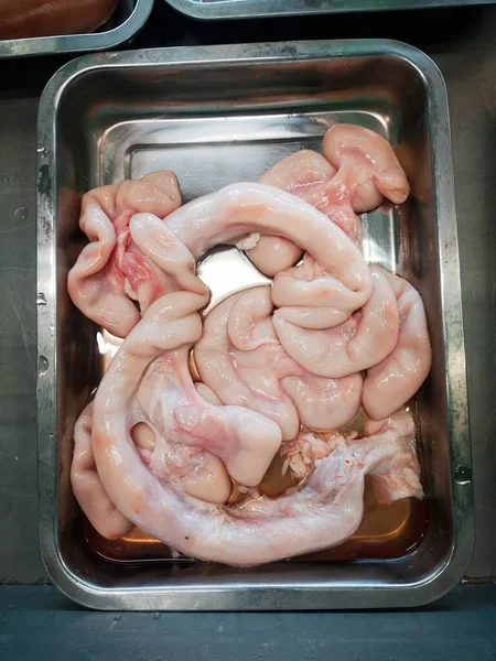 raw chicken breast in a box