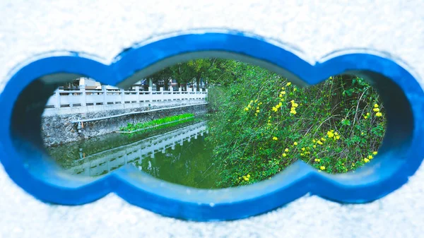 heart shaped toy on the background of the river.