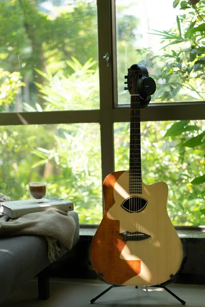 guitar and music instruments in the garden