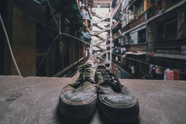 old dirty shoes in the street