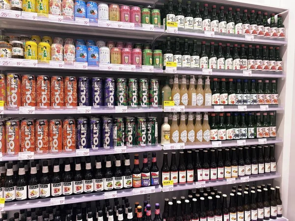 shelves with different bottles of wine in the store