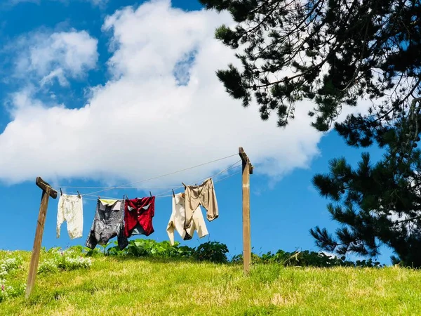 laundry, drying, washing, clothes, blue sky, clouds, summer,