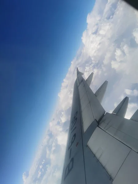 wing of a plane in the sky