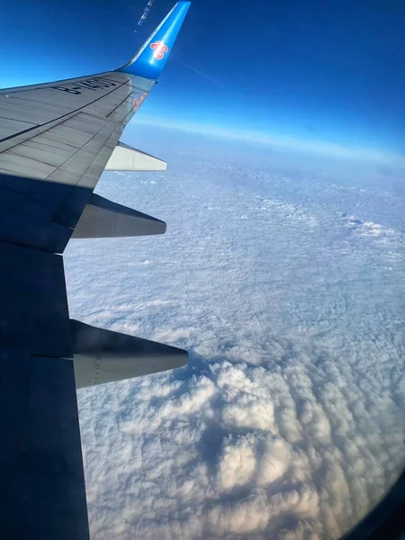 wing of a plane in the sky