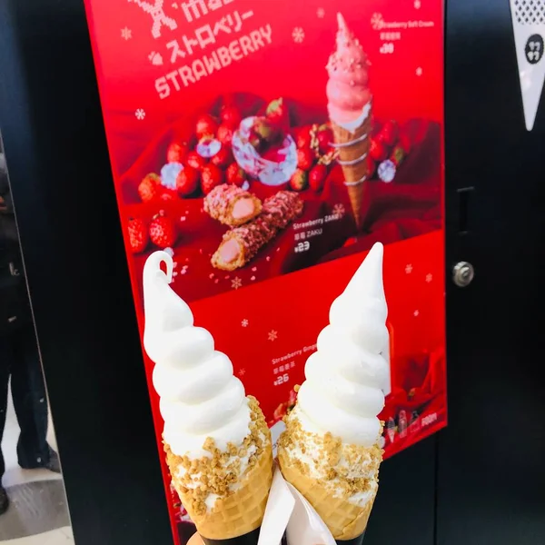 ice cream with chocolate and strawberry cones
