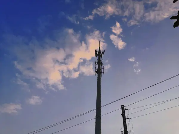 stock image high voltage tower with blue sky