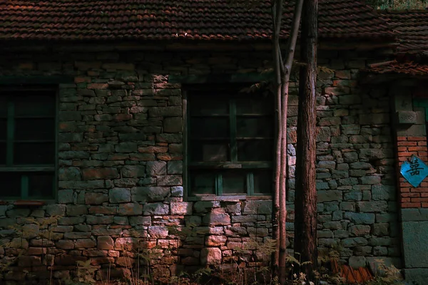 old brick wall with a window