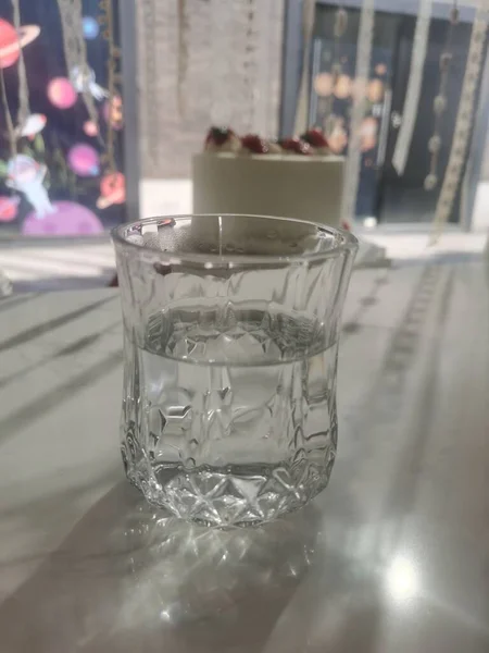 glass with water drops on the table