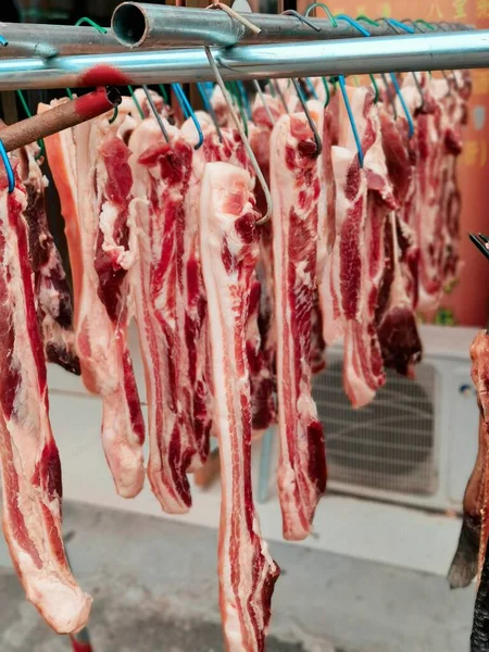 rack of meat in the market