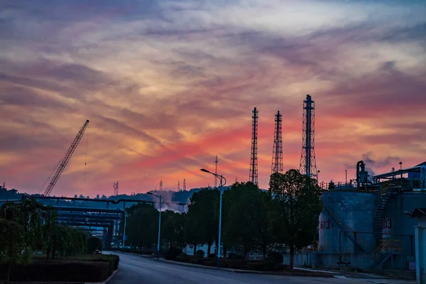 industrial landscape with cranes and building