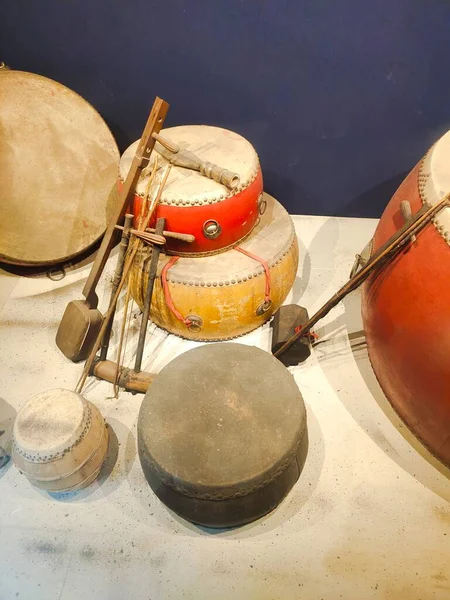 traditional mexican drum, drums, salt, and other objects on the background of the sea.