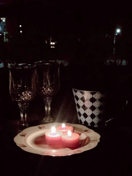 beautiful romantic dinner table with candles and candle