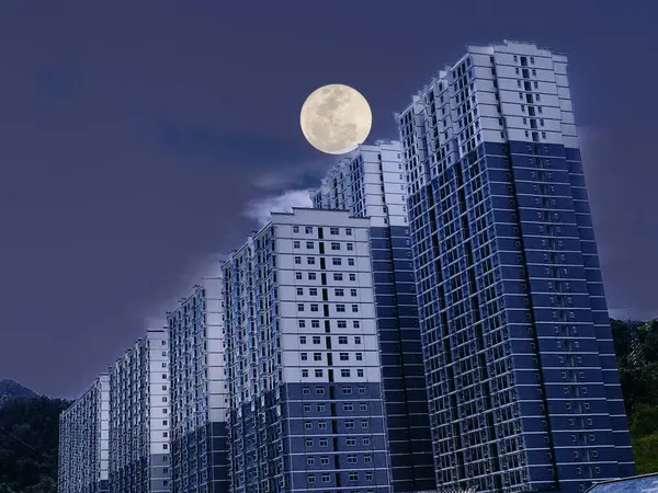modern city buildings in the night sky