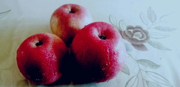 red apples on a white background