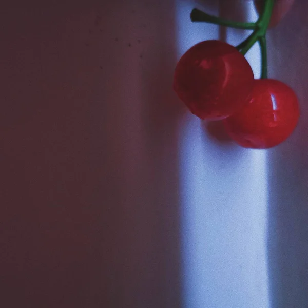 cherry berries on a black background