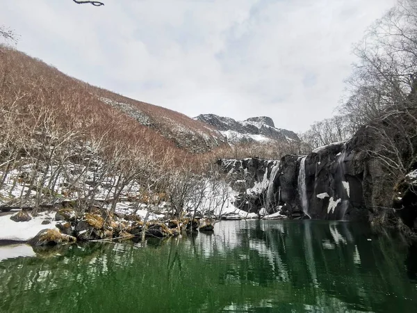 beautiful landscape with a waterfall