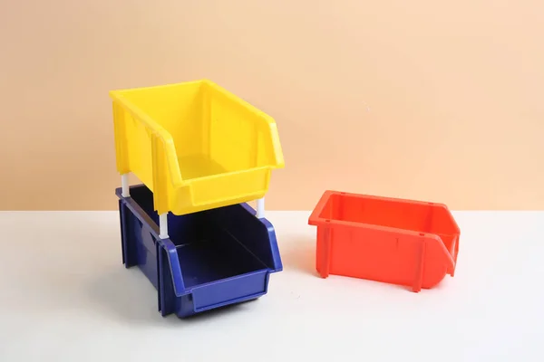 yellow plastic toy box on a white background.