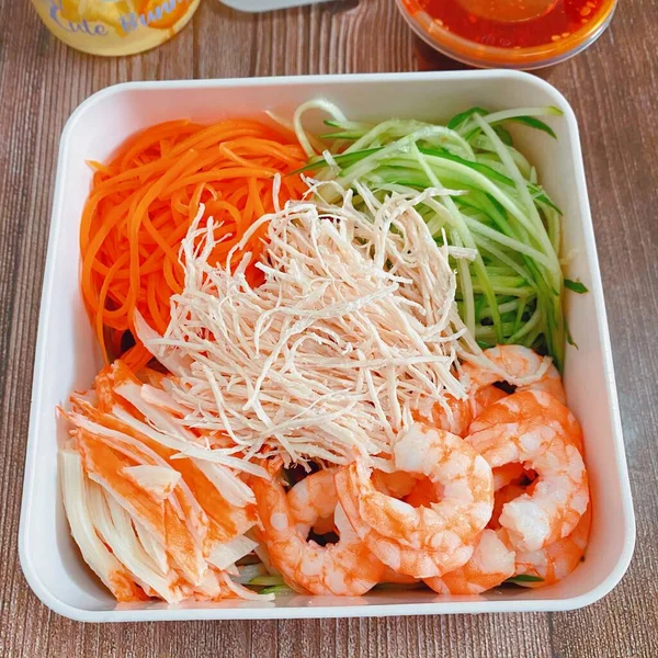thai style shrimp salad with shrimps and vegetables