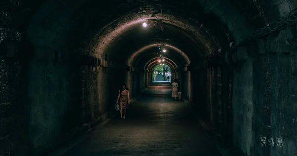 underground tunnel with a dark corridor