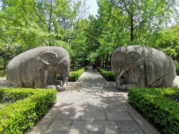 the ancient stone sculpture in the park