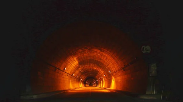 underground tunnel with a large fire