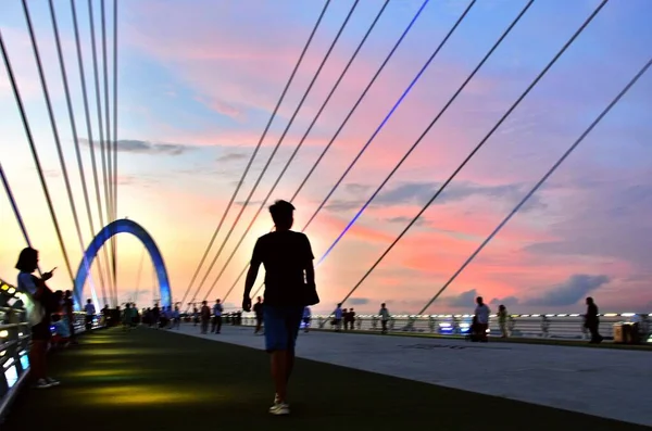 silhouette of a man on the bridge