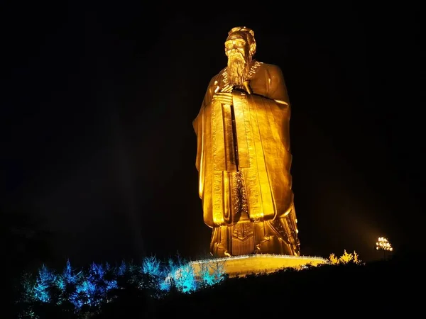 golden buddha statue in the night