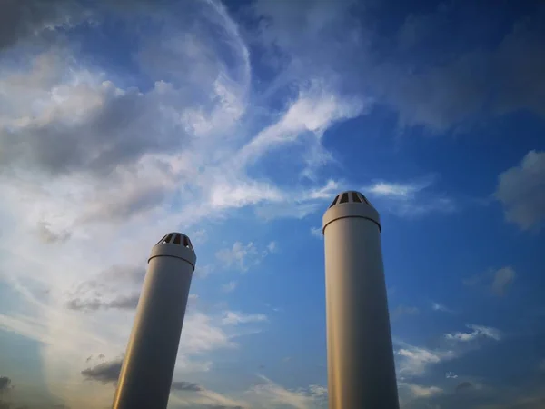 industrial factory, sky and clouds