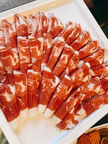 close up of fresh raw meat in a tray
