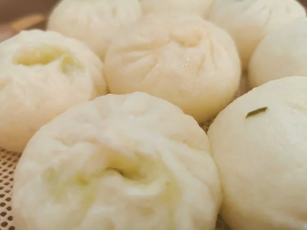 fresh raw dumplings on white background