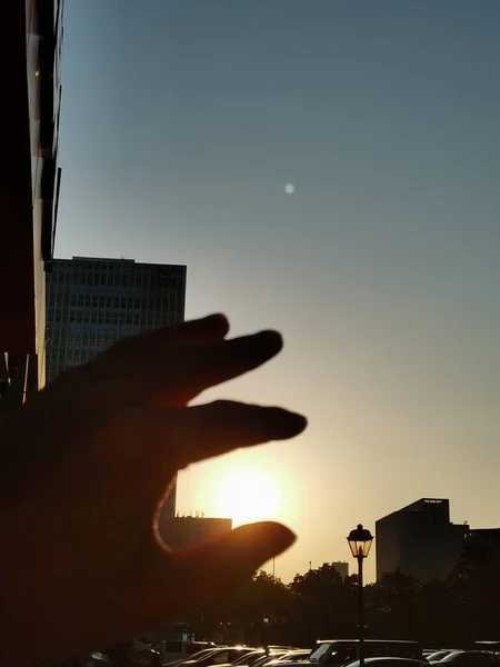 silhouette of a man in a city