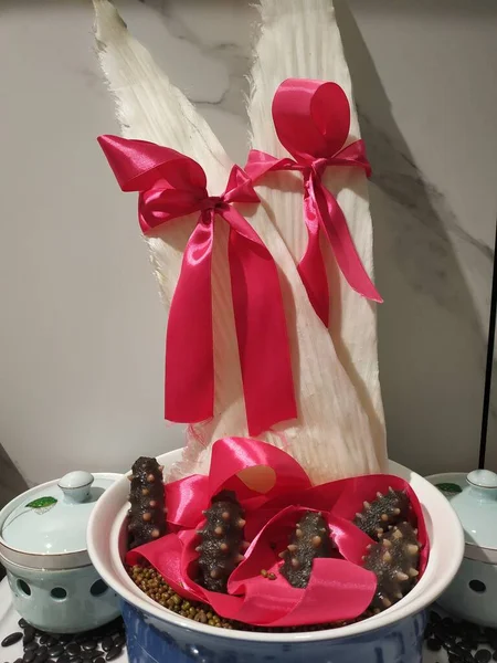 christmas decoration with red roses and gift box