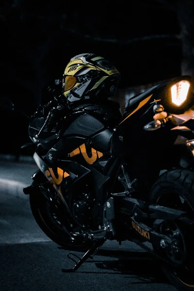 motorcycle helmet with a black background
