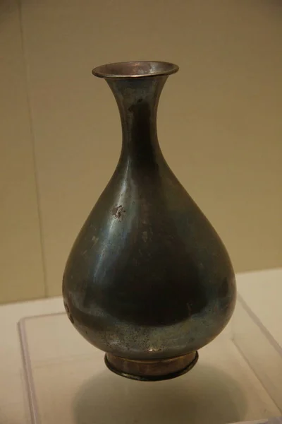 old ceramic vase on a white background