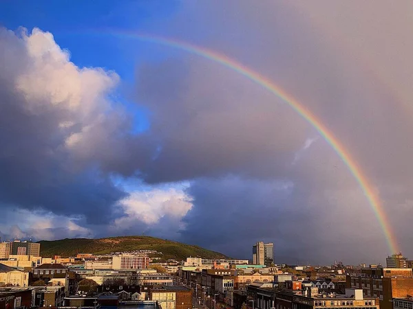 rainbow sky with clouds