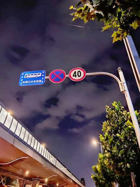 street sign with a lot of people signs