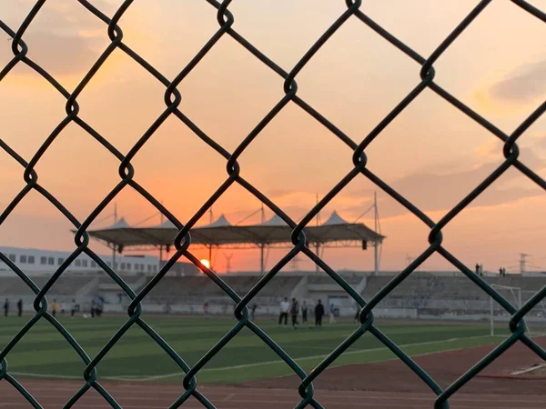 fence with a net and a chain