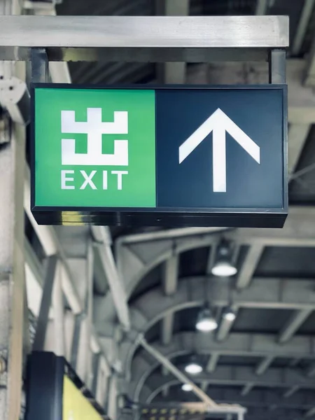 street sign with people signs and symbols