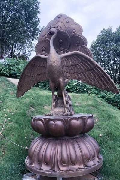 sculpture of a lion statue in the park