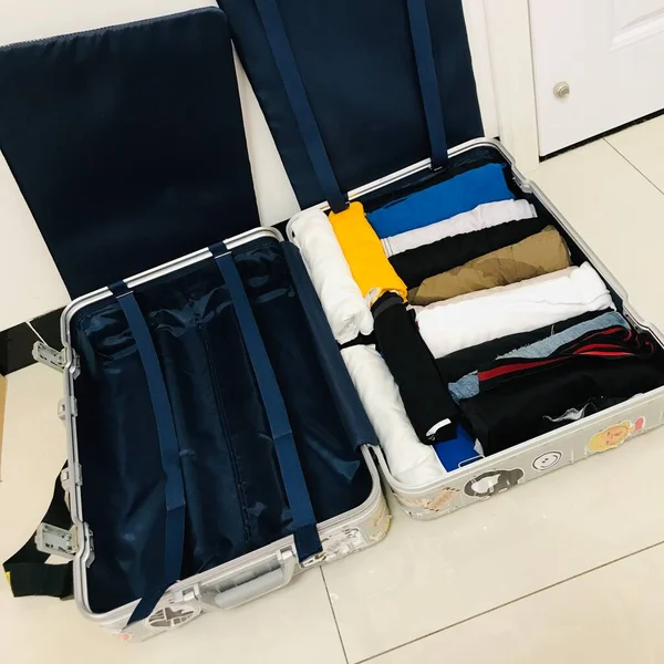 luggage with a suitcase and a bag of suitcases